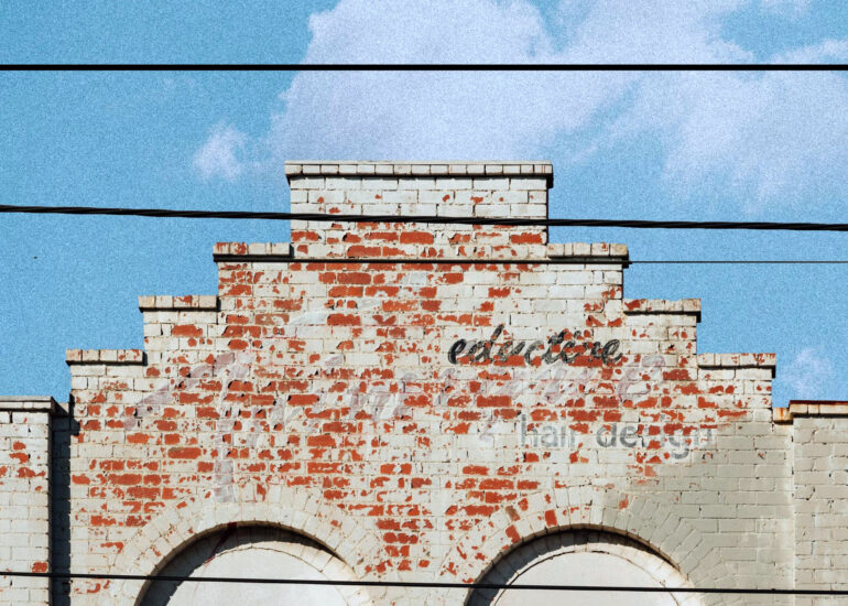 Stepped brick parapet with faded lettering, Carlton, Melbourne inner north, hidden__north documentary photography