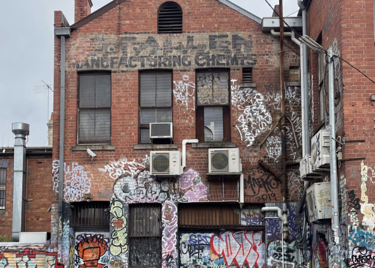 Graffiti-covered rear wall of an old brick factory, Melbourne inner north, hidden__north documentary photography