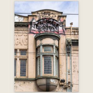 Art nouveau bay window under a graffiti-tagged pediment, Collingwood, Melbourne inner north, hidden__north documentary photography