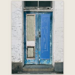 Weathered blue timber double doors in a cracked white wall, Carlton, Melbourne inner north, hidden__north documentary photography