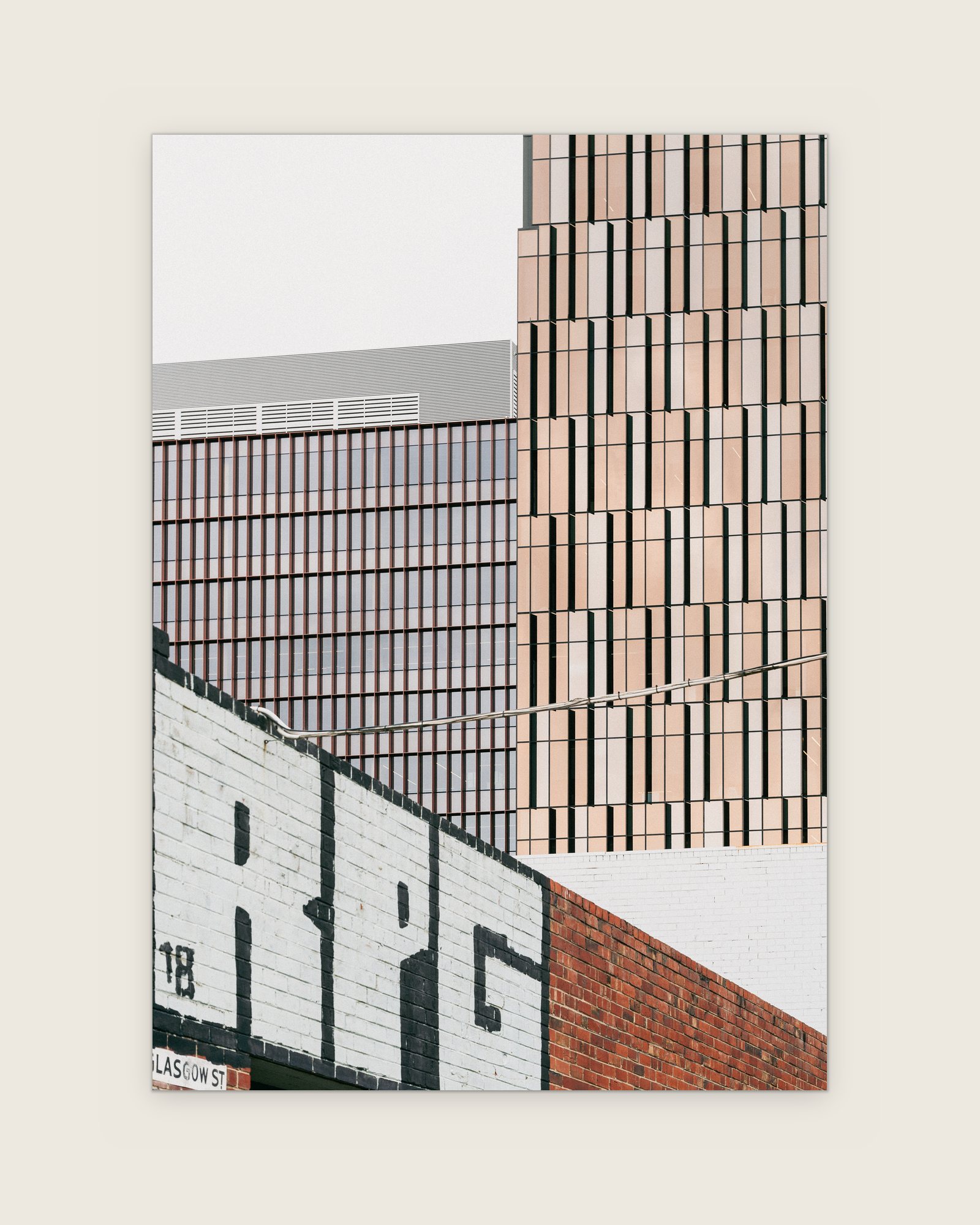 Painted RPG brick wall below new building screens on Glasgow Street, Collingwood, Melbourne inner north, hidden__north documentary photography