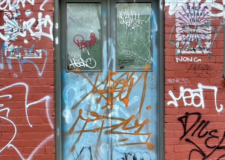Tagged glass double doors, red brick laneway, Melbourne inner north, hidden__north documentary photography