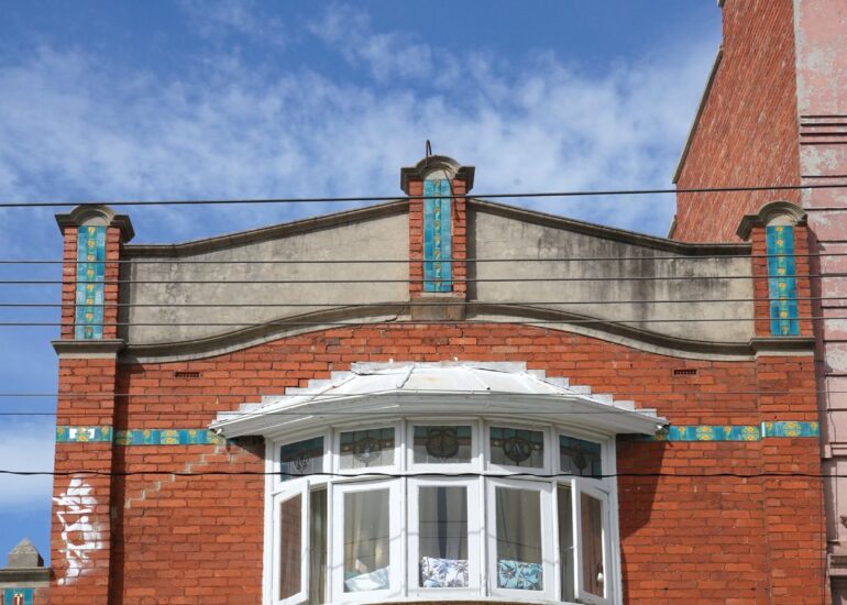 Edwardian bay window with tiled pilasters above Francesca's, Northcote, Melbourne, hidden__north documentary photography