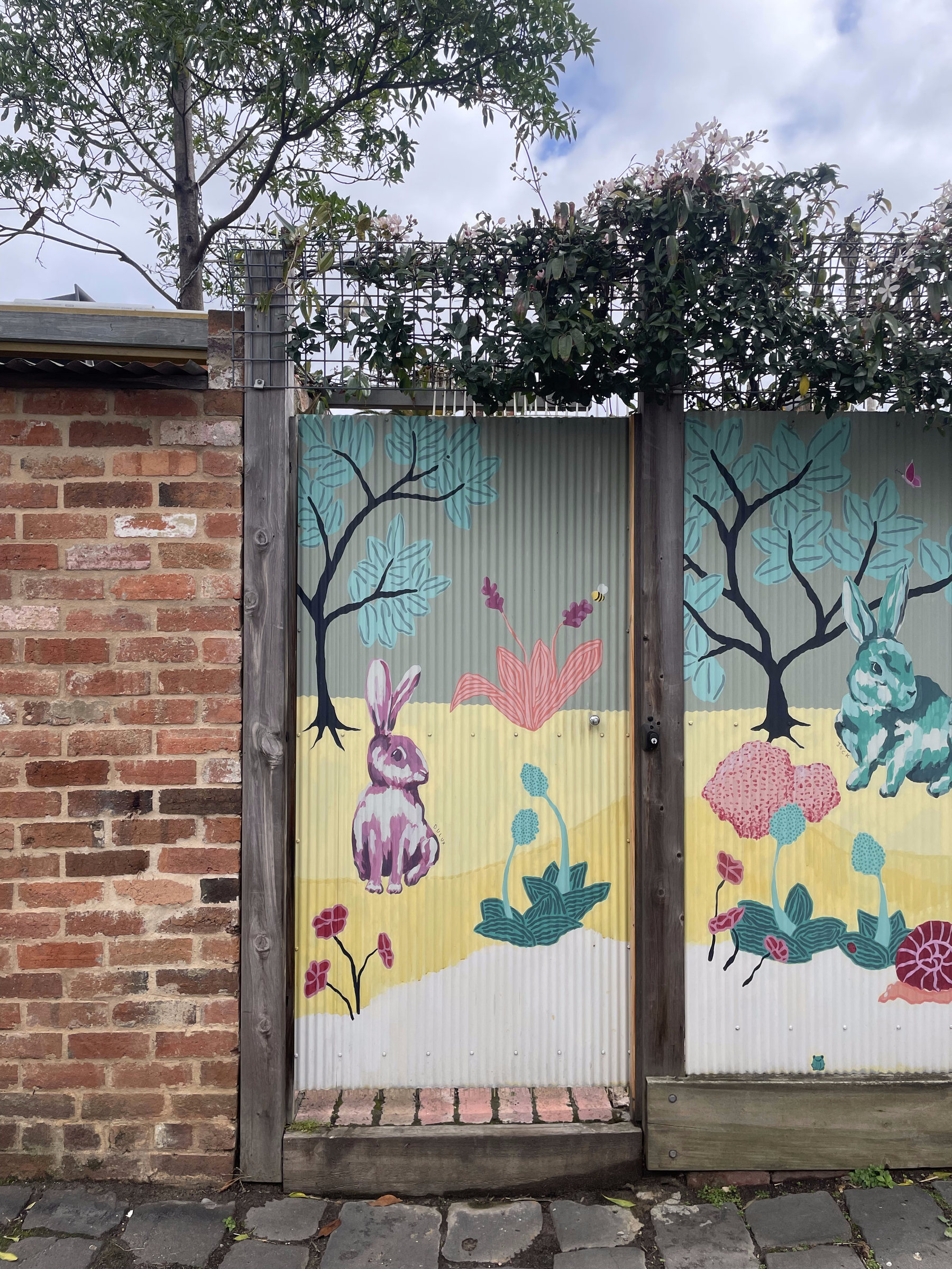 Rabbit and tree mural on a laneway gate, Melbourne inner north, hidden__north documentary photography