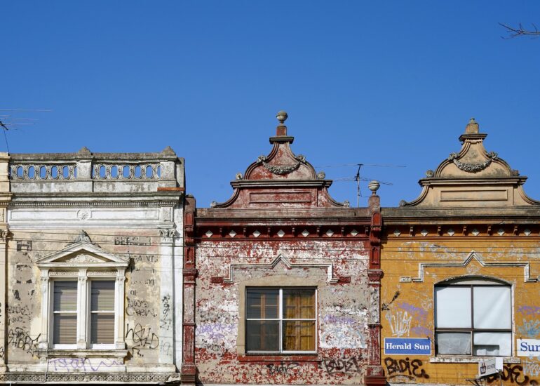 Row of three Victorian parapet shopfronts, Melbourne inner north, hidden__north documentary photography